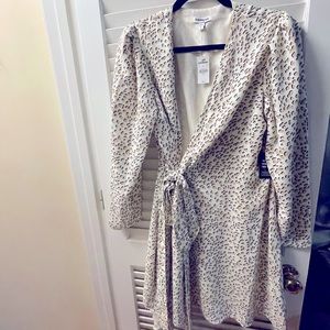NWT. Size LARGE wrap dress. Leopard print mid/short dress length. Express Brand.